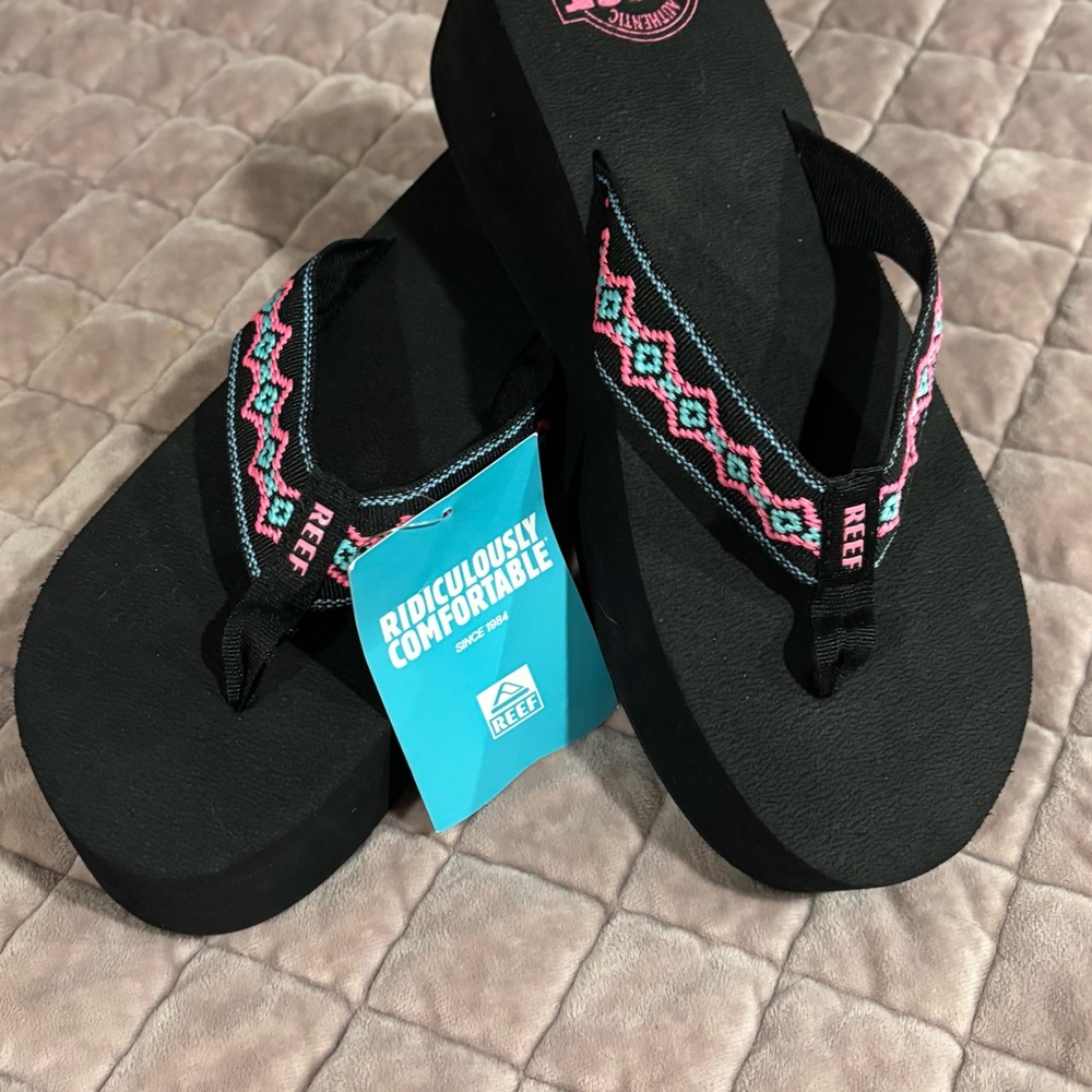 Reef Black Sandals with Pink and Blue Accents
